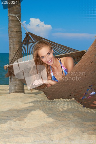 Image of Woman enjoying a tropical getaway