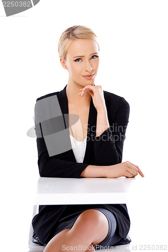 Image of Adorable blond business woman sitting at desk
