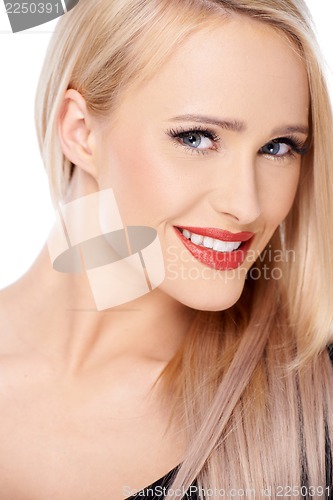 Image of Blond woman with red lipstick smiling