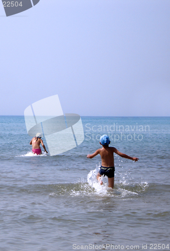 Image of Children playing in the sea