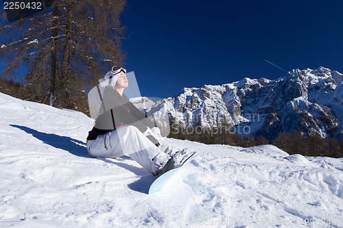 Image of Female Snowboarder in Dolomites