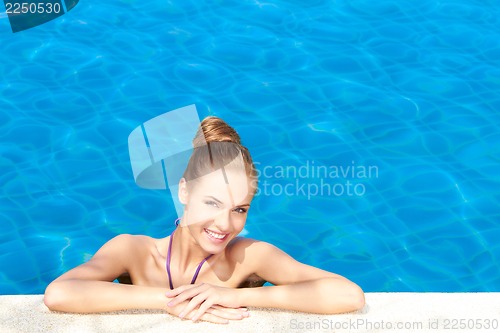 Image of Cute in swimming pool with copy space
