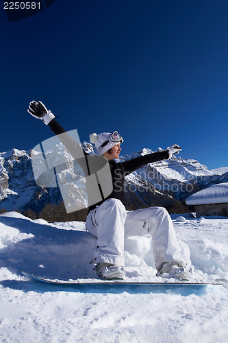 Image of Female Snowboarder in Dolomites