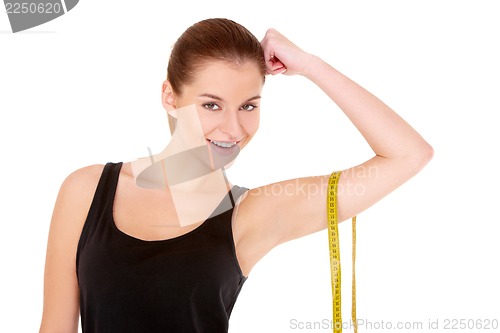 Image of Fitness woman with measure tape