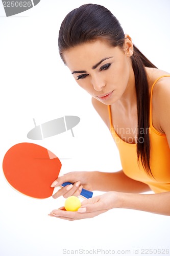 Image of Female tabne tennis player ready to serve