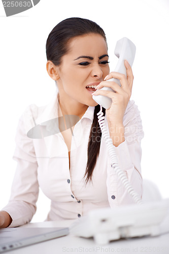 Image of Woman yelling on somebody over telephone