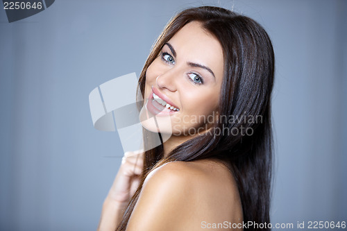 Image of Portrait of beautiful young woman 