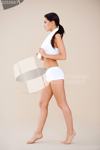 Image of Side shoot of young sporty brunette