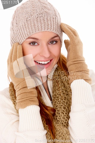 Image of Beautiful woman wearing warm winter clothes