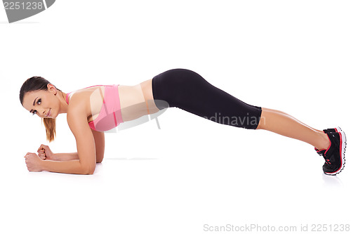 Image of Smiling woman working out