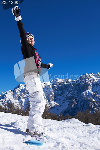 Image of Female Snowboarder in Dolomites