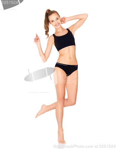 Image of Fitness woman in black sports clothes