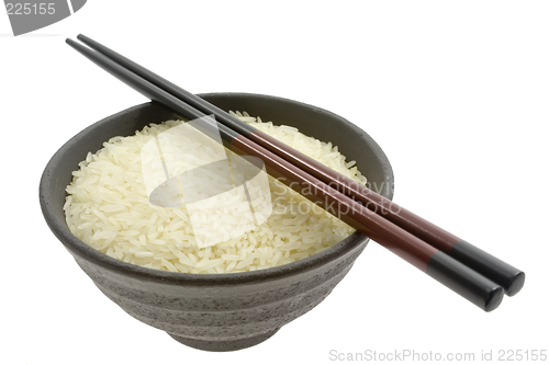 Image of Bowl of rice with chopsticks


