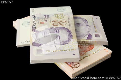 Image of Stacks of Singapore currency

