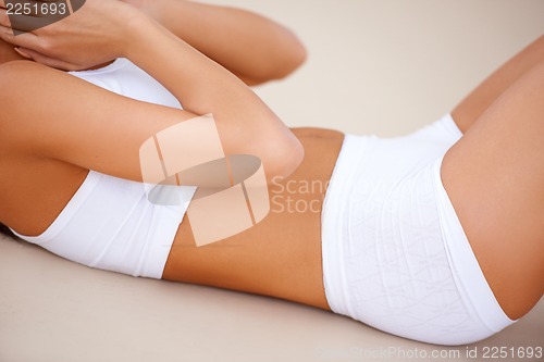 Image of Body part of a exercising woman