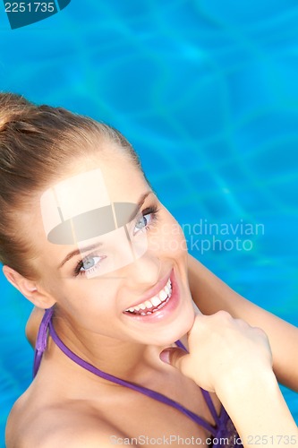 Image of Close up of happy girl in swimming pool
