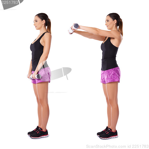 Image of Woman working with dumbbells