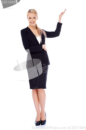 Image of Beautiful blond business woman presenting copy space