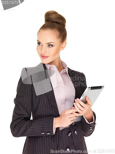 Image of Young business woman working on tablet