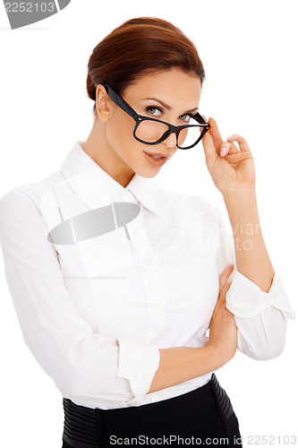 Image of Woman peering over her glasses