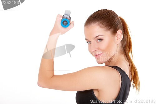 Image of Fitness woman working out with dumbbells