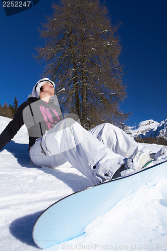 Image of Female Snowboarder in Dolomites