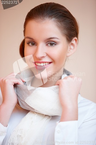 Image of Portrait of young sexy brunette woman in white shirt