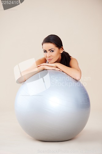 Image of Woman relaxing after exercises
