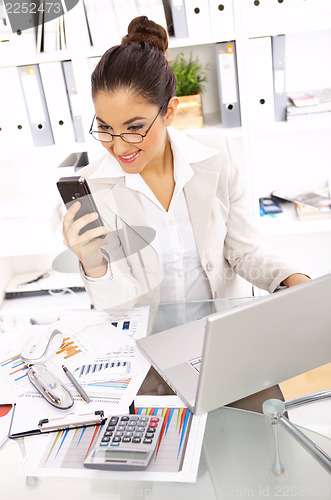 Image of Business Woman in Office