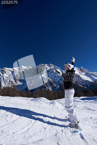 Image of Female Snowboarder in Dolomites