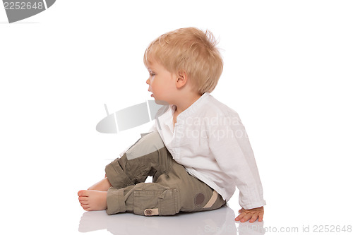 Image of Portrait of a little child sitting