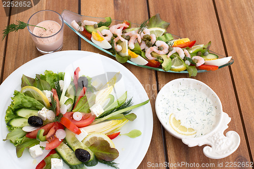 Image of Greek salad and shrimp cocktail
