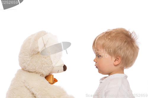 Image of Cute child and teddy bear