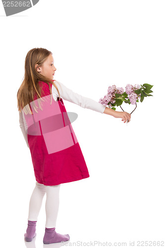 Image of Beautiful young girl with lilac flowers