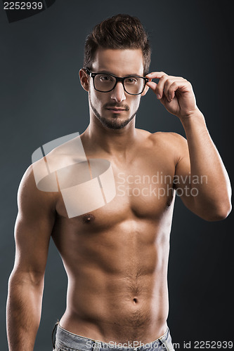 Image of handsome shirtless male model
