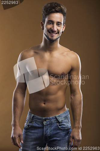 Image of Shirtless male smiling