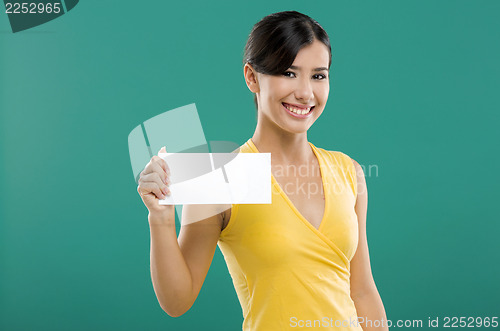 Image of Holding  a white paper card