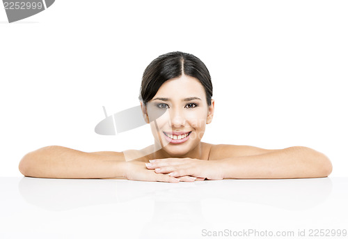 Image of Asian woman showing a blank billboard