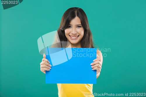 Image of Holding a blue paper