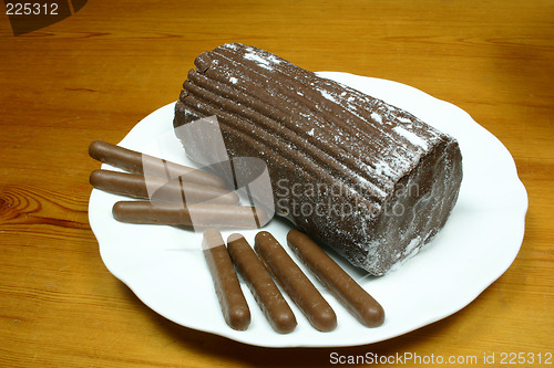 Image of yulelog and chocolate finger biscuits