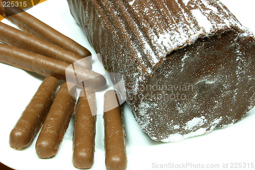 Image of yulelog and chocolate finger biscuits