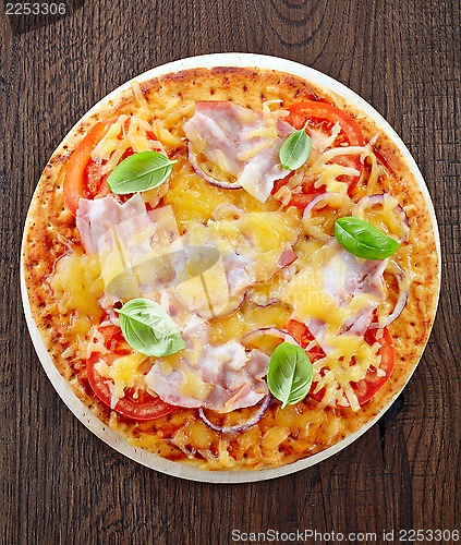 Image of Pizza with bacon and tomato