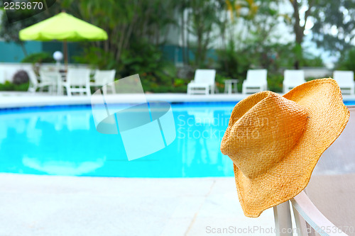 Image of Wicker hat with swimming pool 