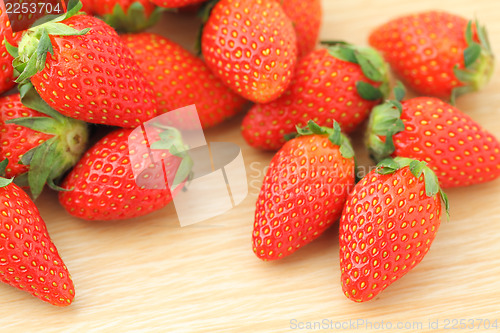 Image of Strawberries on the wooden table 