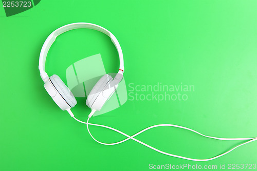 Image of Headphone on green background 