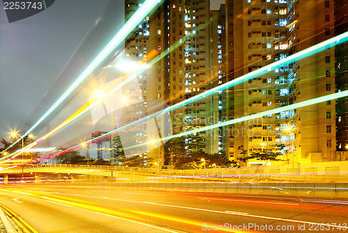 Image of Traffic tail in a city with residentail building 