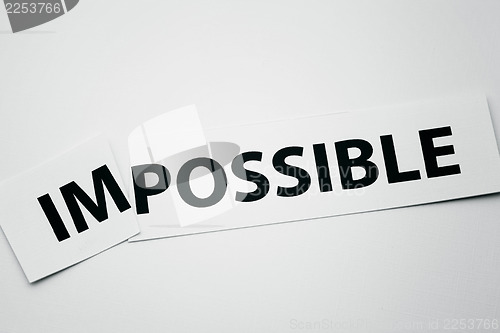 Image of Word impossible cutted to be possible
