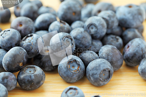 Image of Blueberry on wooden background