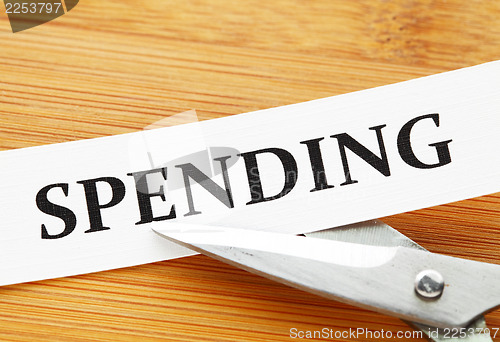 Image of Scissors cut spending