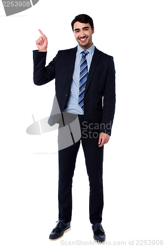 Image of Full length portrait of cheerful businessman